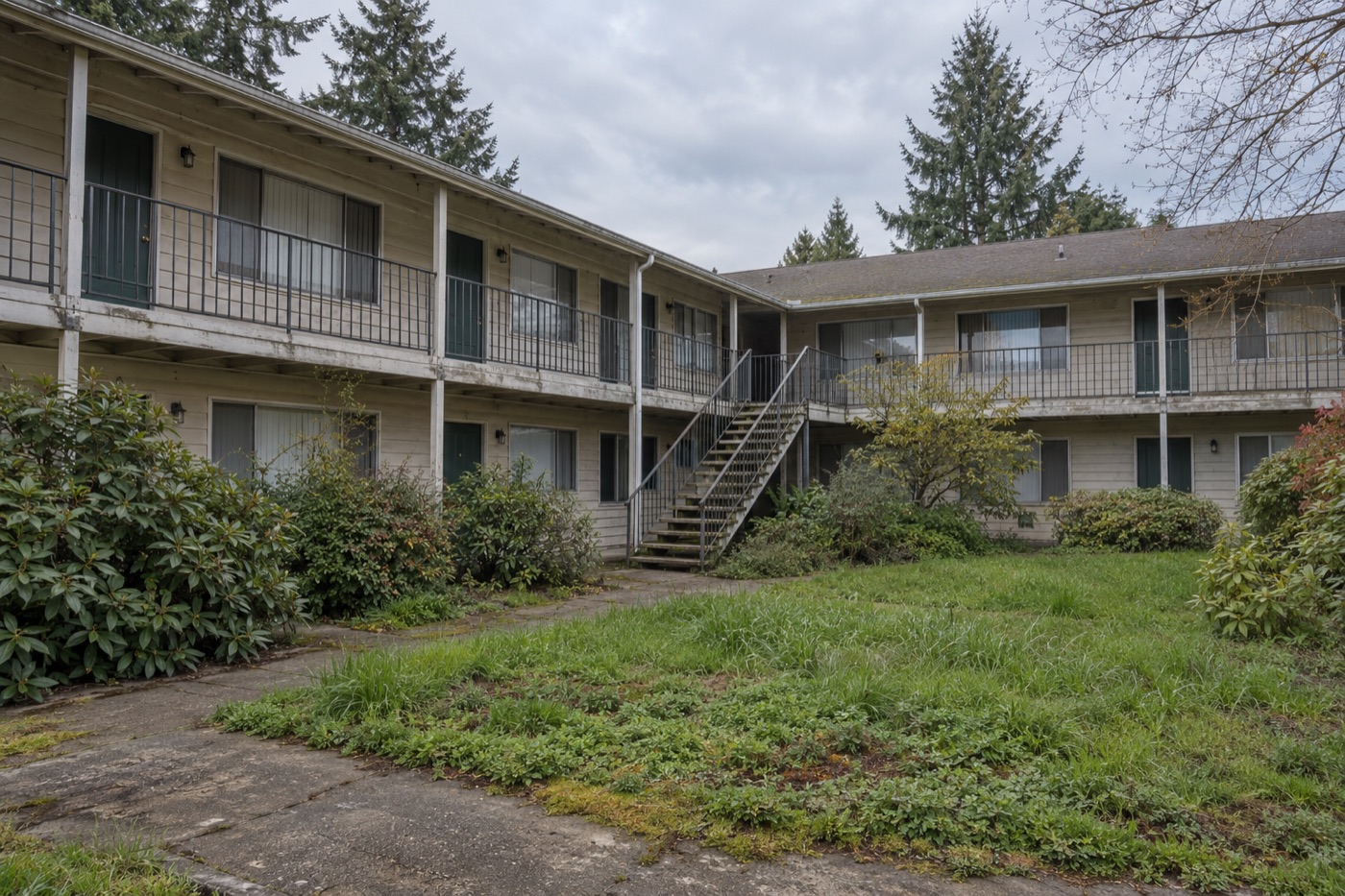 Dated walk-up apartment building of the kind sometimes offered at auction